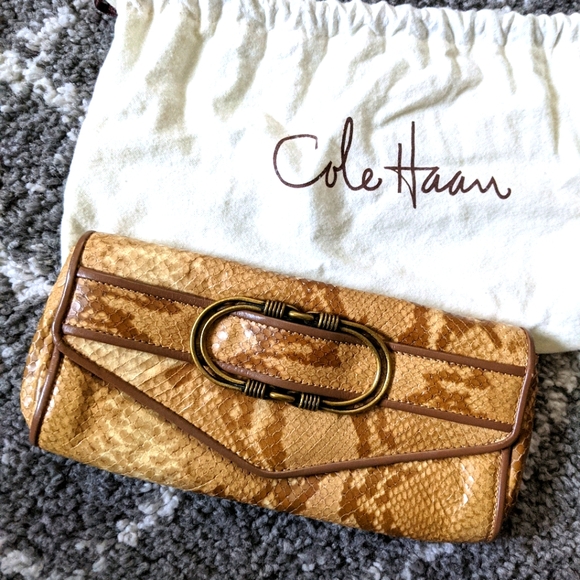 Snake embossed clutch -EUC